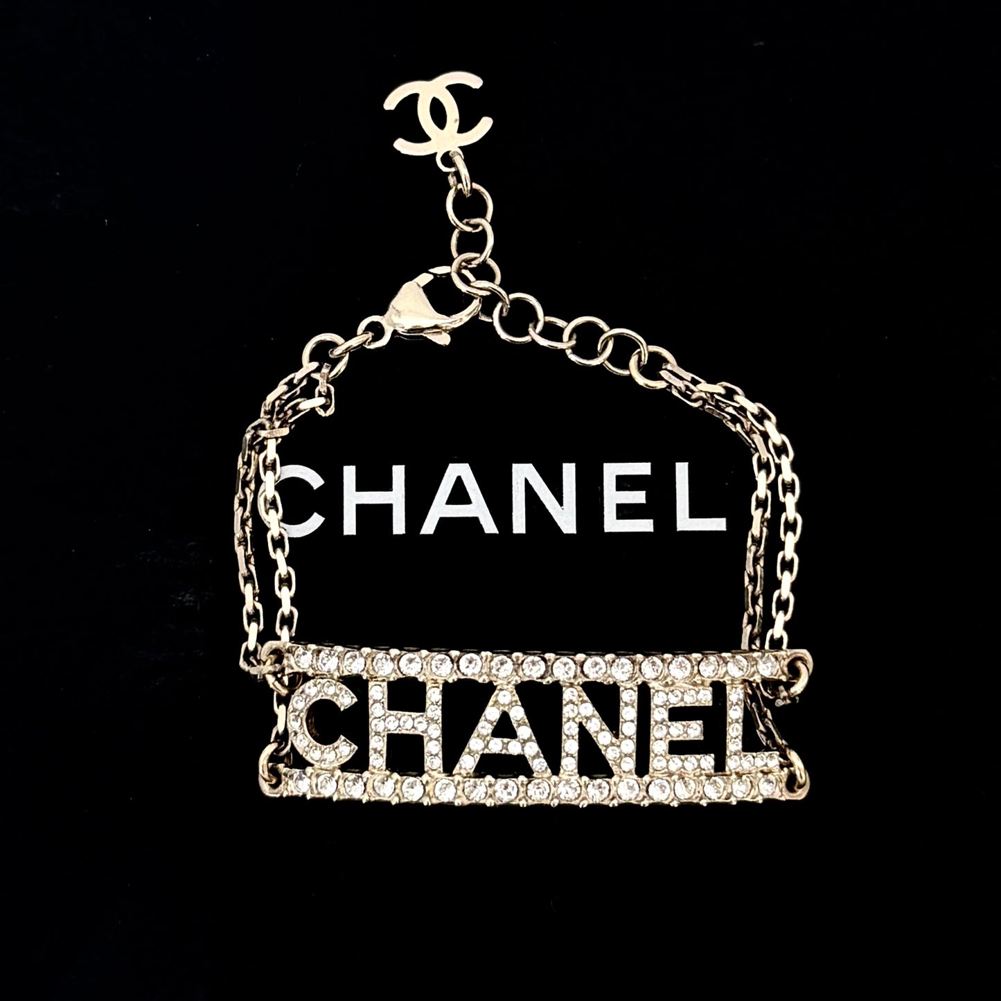 CHANEL Full Crystal Paved Hollow CHANEL Letter Logo Bracelet