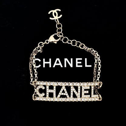 CHANEL Full Crystal Paved Hollow CHANEL Letter Logo Bracelet