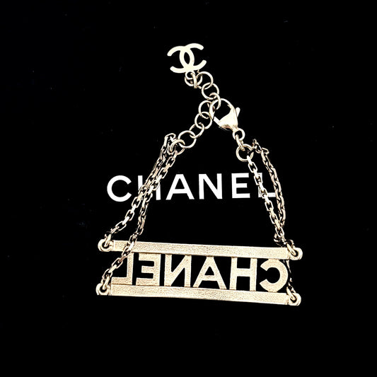 CHANEL Full Crystal Paved Hollow CHANEL Letter Logo Bracelet