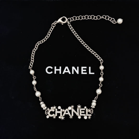 CHANEL Crystal Snowflake CHANEL Logo Pendant bracelet