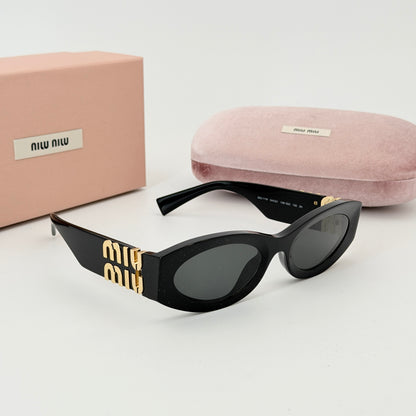 Miu Miu Eyewear oval-frame Sunglasses | Black
