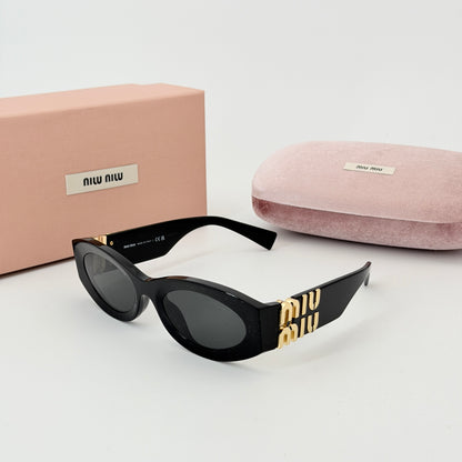 Miu Miu Eyewear oval-frame Sunglasses | Black
